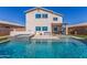 Inviting backyard featuring a sparkling pool and spa with a seating area at 29051 N Shannon Dr, San Tan Valley, AZ 85143
