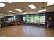 Spacious fitness studio with exercise equipment, ceiling fans and natural light for an active lifestyle at 29624 N 128Th Ln, Peoria, AZ 85383