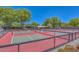 The community has multiple outdoor pickleball courts with nice landscaping at 29624 N 128Th Ln, Peoria, AZ 85383