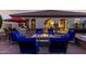 Backyard patio with built-in bar, fire pit, and ample seating, perfect for outdoor living at 3150 E Isaiah Ave, Gilbert, AZ 85298