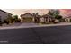 Charming single-story home with a well-manicured lawn and a spacious two-car garage at 3150 E Isaiah Ave, Gilbert, AZ 85298