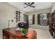The office has a ceiling fan and a desk near shuttered windows for natural light at 3150 E Isaiah Ave, Gilbert, AZ 85298