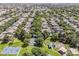 Gorgeous aerial view of houses with a neighborhood park and a playground area at 3252 E Lexington Ave, Gilbert, AZ 85234