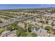 Picturesque aerial view of a residential community with houses and neighborhood thoroughfare at 3252 E Lexington Ave, Gilbert, AZ 85234