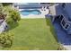 Aerial view highlighting a well-maintained lawn and a swimming pool at 3252 E Lexington Ave, Gilbert, AZ 85234