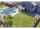 Aerial view showcasing a private backyard oasis with a large pool and seating area at 3252 E Lexington Ave, Gilbert, AZ 85234