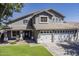 Charming two-story home with a three-car garage and manicured lawn at 3252 E Lexington Ave, Gilbert, AZ 85234