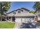 Charming two-story home with a three-car garage and well-maintained landscaping at 3252 E Lexington Ave, Gilbert, AZ 85234
