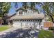 Two-story home featuring a three-car garage and well-maintained landscaping at 3252 E Lexington Ave, Gilbert, AZ 85234