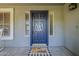 Charming front door with decorative wreath, sidelights, and a 'Home Sweet Home' welcome mat at 3252 E Lexington Ave, Gilbert, AZ 85234