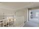 Loft with a railing overlooking the living room, offering an open layout and access to bedrooms at 3252 E Lexington Ave, Gilbert, AZ 85234