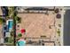Direct aerial view of home with fenced yard, patio, lawn and a neighboring swimming pool at 3269 E Ironside Ln, Gilbert, AZ 85298