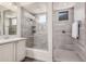 Bathroom featuring a shower, vanity, framed mirror, and soft neutral tones at 3269 E Ironside Ln, Gilbert, AZ 85298