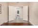 Bedroom featuring tile floors, neutral walls, open doors to the bathroom, and white doors at 3269 E Ironside Ln, Gilbert, AZ 85298
