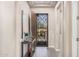 Welcoming entryway with a decorative security door, console table, and neutral paint at 3269 E Ironside Ln, Gilbert, AZ 85298