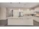Spacious kitchen island with granite countertops, ample storage, and stainless steel appliances at 3269 E Ironside Ln, Gilbert, AZ 85298