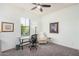 Bright office space with a glass desk, comfortable chair, and neutral decor at 3269 E Ironside Ln, Gilbert, AZ 85298