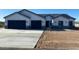 Beautiful single-story home featuring a two-car garage and desert landscaping, presenting a modern and inviting facade at 34889 N 3Rd St, Phoenix, AZ 85086