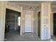 Unfinished interior featuring drywall, doorways, and flooring, ready for customization to fit your unique style and needs at 34889 N 3Rd St, Phoenix, AZ 85086