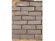 Close-up view of rustic brick pavers, ideal for creating charming patios, walkways, and outdoor living spaces at 34889 N 3Rd St, Phoenix, AZ 85086