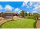 Expansive backyard with artificial turf, putting green, trampoline, mature landscaping, and comfortable Arizona outdoor living at 3816 E El Sendero Rd, Cave Creek, AZ 85331