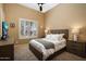 Cozy bedroom with a comfortable bed, plush pillows, and a window overlooking the outdoors, offering a tranquil retreat at 3816 E El Sendero Rd, Cave Creek, AZ 85331