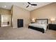 Spacious main bedroom with a comfortable bed, modern furniture, and neutral decor, creating a calming retreat at 3816 E El Sendero Rd, Cave Creek, AZ 85331