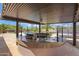 Inviting outdoor kitchen features granite countertops, a BBQ grill, and views of a desert landscape at 3816 E El Sendero Rd, Cave Creek, AZ 85331