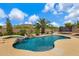 Lush backyard features a private pool, spa, rock waterfall, and vibrant landscaping, creating a serene outdoor retreat at 3816 E El Sendero Rd, Cave Creek, AZ 85331
