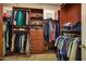 Organized walk-in closet with custom shelving, drawers, and ample hanging space for clothing and accessories at 3816 E El Sendero Rd, Cave Creek, AZ 85331