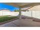 Covered patio overlooking a well-maintained backyard with rock landscaping at 3994 E Maplewood St, Gilbert, AZ 85297