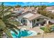 Inviting backyard pool and patio area with covered seating, perfect for relaxation at 4061 W Tonopah Dr, Glendale, AZ 85308