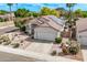 Charming home with well-maintained landscaping, solar panels, and a two-car garage at 4061 W Tonopah Dr, Glendale, AZ 85308