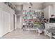 Spacious office featuring tile flooring, large bookcase, and a workstation area at 4061 W Tonopah Dr, Glendale, AZ 85308