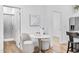 Cozy dining nook with marble table, plush seating, and access to the modern bathroom at 4220 N 32Nd St # 39, Phoenix, AZ 85018