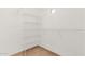 Walk-in closet with wire shelving and tile flooring at 4644 N 22Nd St # 1137, Phoenix, AZ 85016
