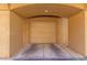 Attached garage with concrete driveway and automatic door in covered alcove at 4644 N 22Nd St # 1137, Phoenix, AZ 85016