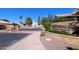 Scottsdale Highland Estates entrance featuring manicured landscaping, stone signage, and secured gated access for residents at 4747 N 84Th Way, Scottsdale, AZ 85251