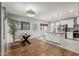 Modern kitchen features white cabinets, granite countertops, and stainless steel appliances at 4747 N 84Th Way, Scottsdale, AZ 85251