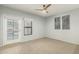 Bright main bedroom with a glass door that has access to the refreshing pool at 4747 N 84Th Way, Scottsdale, AZ 85251