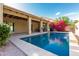 Backyard pool with a patio and view of the surrounding yard with bougainvillea at 4747 N 84Th Way, Scottsdale, AZ 85251