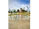Community splashpad with colorful arching water features on a sunny day at 4747 N 84Th Way, Scottsdale, AZ 85251