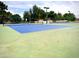 Well-maintained tennis courts featuring a blue and green surface at 4747 N 84Th Way, Scottsdale, AZ 85251