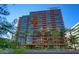 Modern high rise building with palm tree landscaping along the street at 4808 N 24Th St # 527, Phoenix, AZ 85016
