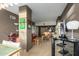 Open-concept living space with dining area and kitchen, featuring modern decor and ample natural light at 4808 N 24Th St # 527, Phoenix, AZ 85016