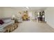 Bright living room featuring a plush couch, recliner, and a dining area with a ceiling fan at 562 S Palo Verde Way, Mesa, AZ 85208