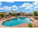 This is a refreshing private pool featuring an attached jacuzzi and outdoor seating area at 5639 S Four Peaks Pl, Chandler, AZ 85249