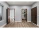 Bright, airy bedroom with open closet and bathroom doors highlighting ample storage and convenience at 5740 N Casa Blanca Dr, Paradise Valley, AZ 85253