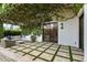 Charming covered patio with stylish seating and climbing vines, creating a tranquil outdoor retreat with access to indoors at 5740 N Casa Blanca Dr, Paradise Valley, AZ 85253
