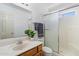 Bathroom featuring frosted glass shower and neutral colors at 63 W Los Arboles Dr, Tempe, AZ 85284